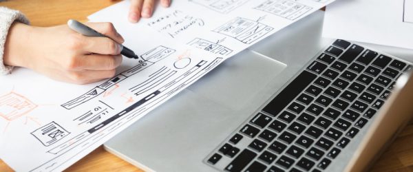 designer-drawing-website-mockup